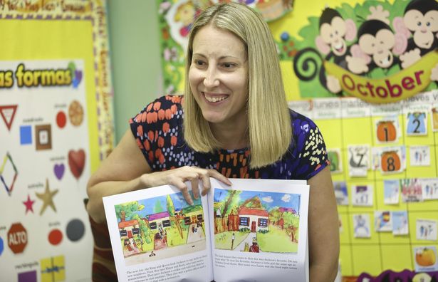 C.K. Carter, 37, author, mother and teacher, at a reading of her children books, The Castle Across the Street and Silly Dog Gus, Oct. 08, 2014 at the Little Place pre-school in Wellington. Carter is writing Jackson's First Day of School a sequel to her first book. (Bill Ingram / Palm Beach Post)