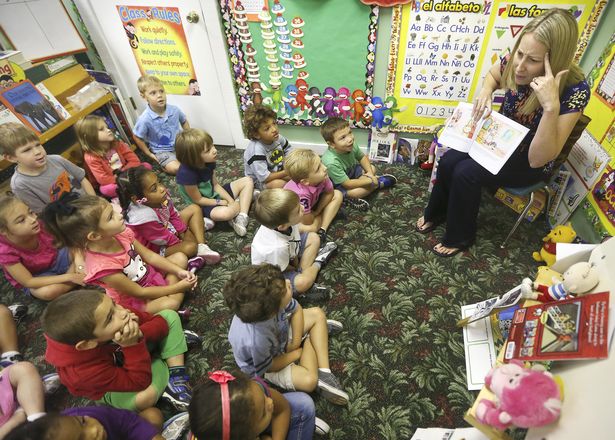 C.K. Carter reads her award-winning book, The Castle Across the Street, to students at the Little Place pre-school in Wellington on Oct. 8, 2014. (Bill Ingram / Palm Beach Post)